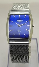 Vintage Seiko Slim Quartz Tank Watch Roman Numeral Blue Dial Two Hand Watch