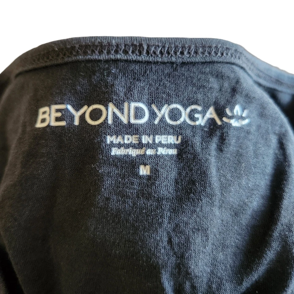 Camiseta sin mangas Beyond Yoga negra para mujer talla mediana Foto 2 de 4