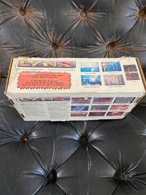 Atari Lynx Console With Case, AC adaptor, complete box, instructions, 4 games