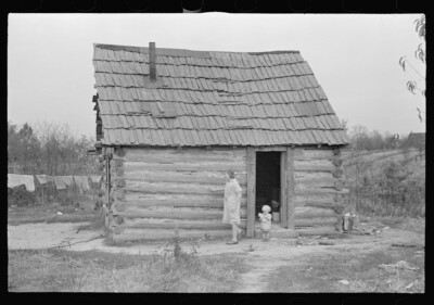8'' x 10'' Photo Home of a family of ten that has been on relief for eighteen mon