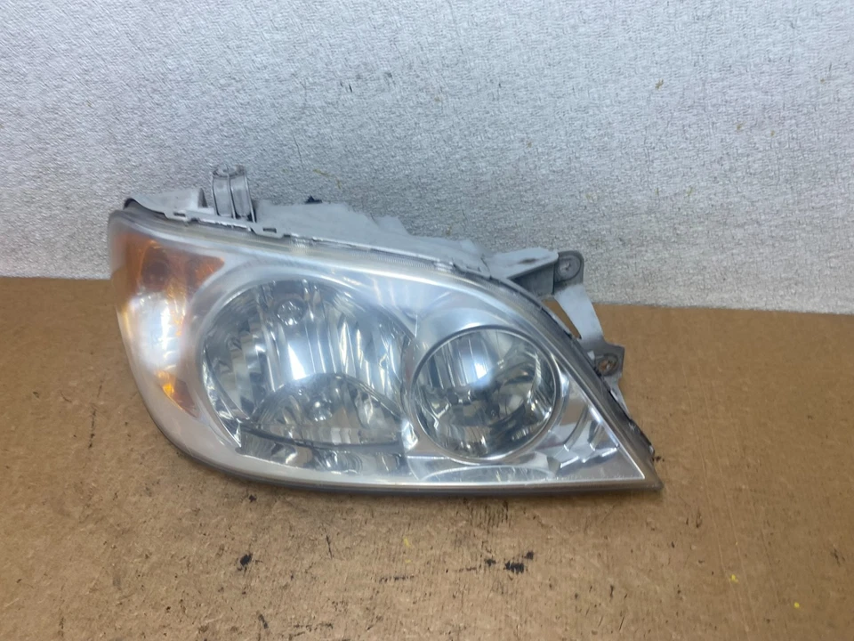 Faro lateral derecho pasajero Kia Sedona 2002 a 2005 OEM S7458 CV Foto 2 de 4