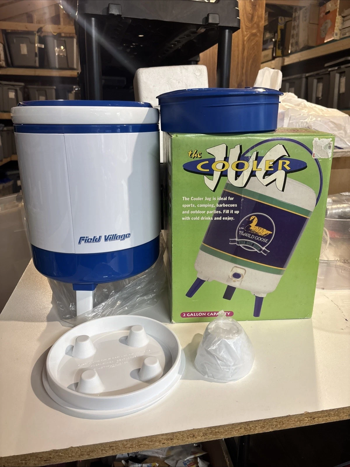 the Jug Cooler 2 Gallon Insulated Drink Cooler w/ handle, legs, New in box.