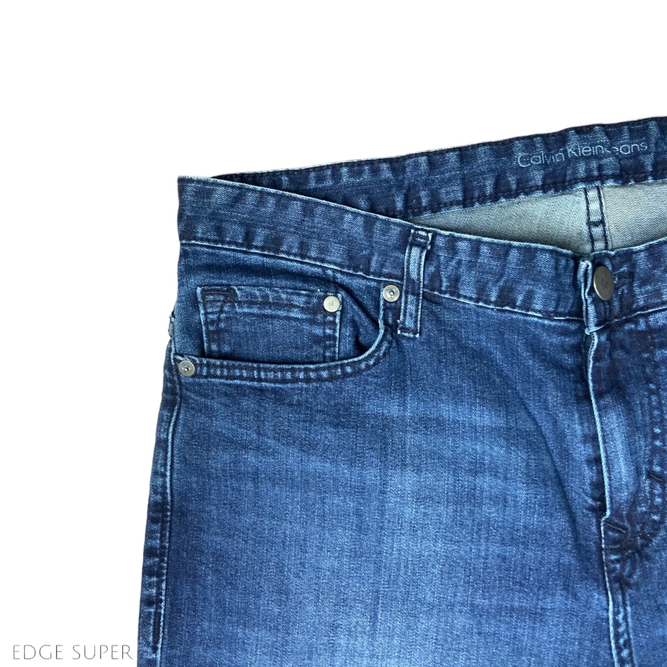 Pantalones de mezclilla desgastados elásticos lavado azul pierna recta Calvin Klein talla 36 X 31 Foto 2 de 4