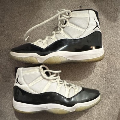 Jordan Air Jordan 11 Black/White Patent Leather High Top Basketball Sneaker