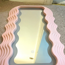 Pink Wavy Asymmetrical Framed Wall Mirror 26x19in Matte Plastic, Vertical
