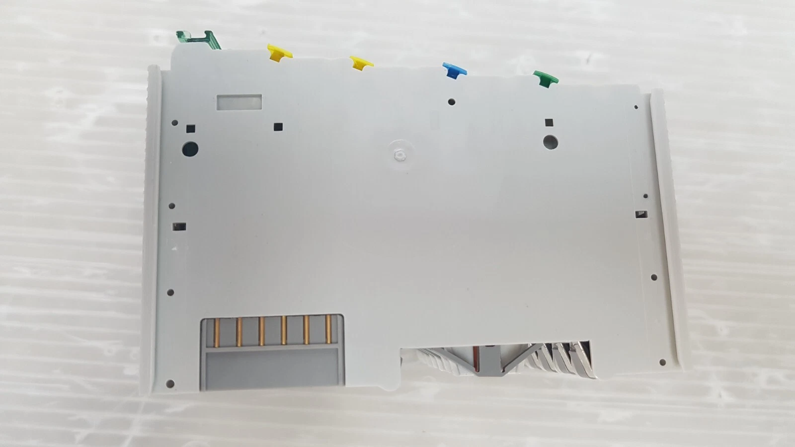 Plain side of a Beckhoff KL3002 terminal with K-bus contacts