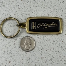 Oldsmobile Cars Automobiles Gold Tone Metal Keychain Key Ring #50427