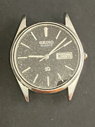 Vintage Mens Seiko Quartz SQ Silver Tone with Black Dial Day/Date Wrist Watch