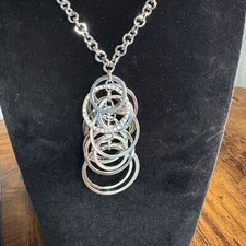 New York  Company Silver-Tine Rhinestone Rippling Rings Pendant Necklace