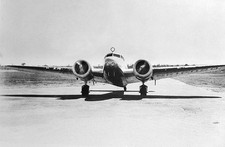 Amelia Earhart is in her Lockheed Electra at an airstrip in Austra- Old Photo