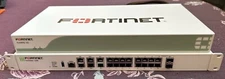 Fortinet FortiGate 100E Firewall with FortiRPS redundant power supply, used.