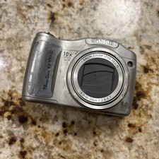 Canon PowerShot SX110 IS 9.0MP 10x Optical Zoom Silver Digital Camera. CORROSION