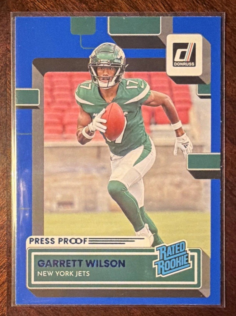 2022 Donruss Garrett Wilson Blue Press Proof Rated Rookie #306 New York Jets