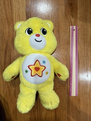 The Basic Fun Care Bears Superstar Bear Plush Toy is a 14-inch plush toy