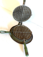ANTIQUE TOY CAST IRON CHILDS WAFFLE MAKER. FLIPS TO COOK THE OTHER SIDE, BASE