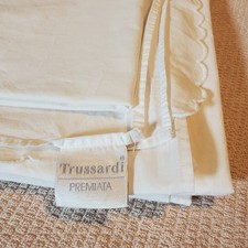 Lenzuolo piatto Trussardi bianco 55X84+18 gonna a piedi federa smerlata