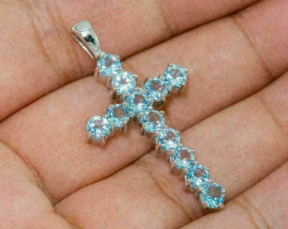 14k White or Yellow Gold Aquamarine and Diamond Cross Pendant 14k White or Yellow Gold Aquamarine and Diamond Cross Pendant