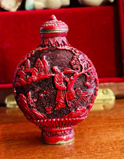 Vintage Chinese carved red decorative mini bottle with stopper and spoon.