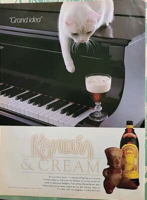 1990 Kahlua & cream liqueur  white kitten piano vintage ad