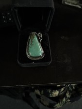 1/2 X 1 Turquoise Stone, Indeed Into A Loop Wire Mash With A 7 Inch Ring .