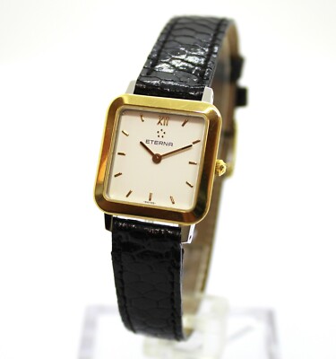 Eterna 1856 Quartz Watch In Steel And Gold With Black Leather Strap