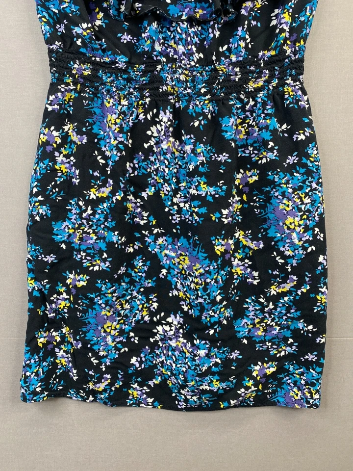 Camiseta sin mangas azul con volantes florales y bolsillos Elle para mujer sin mangas cuello en V talla pequeña Foto 2 de 4