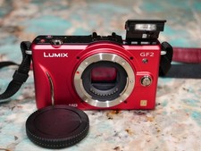 Beautiful red panasonic lumix gf2, mft, excellent shape,with battery and charger