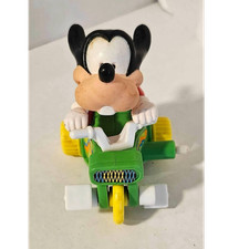 Disney Goofy 1984 Vintage Wind-Up Toy Figure on Green Tricycle