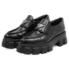 PRADA Monolith Triangle Plate Leather Loafers Women Size 37.5 Black