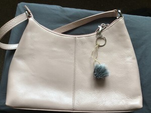 grey fluffy bag