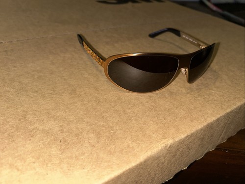 Lunettes de soleil Prada SPR 59i 66/13 monture dorée verres marron avec perles