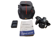 Sony Cyber-shot DSC-HX1 9.1MP Digital Camera with 20x Optical Zoom, Bundle
