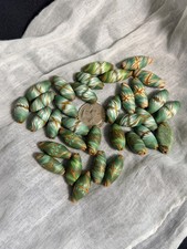 Handcrafted polymer clay artisans beads warm and cool green mix