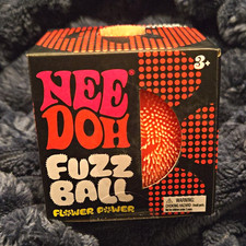 NeeDoh Fuzz Ball Flower Power Velvet Squeeze Stress Ball Orange/Purple
