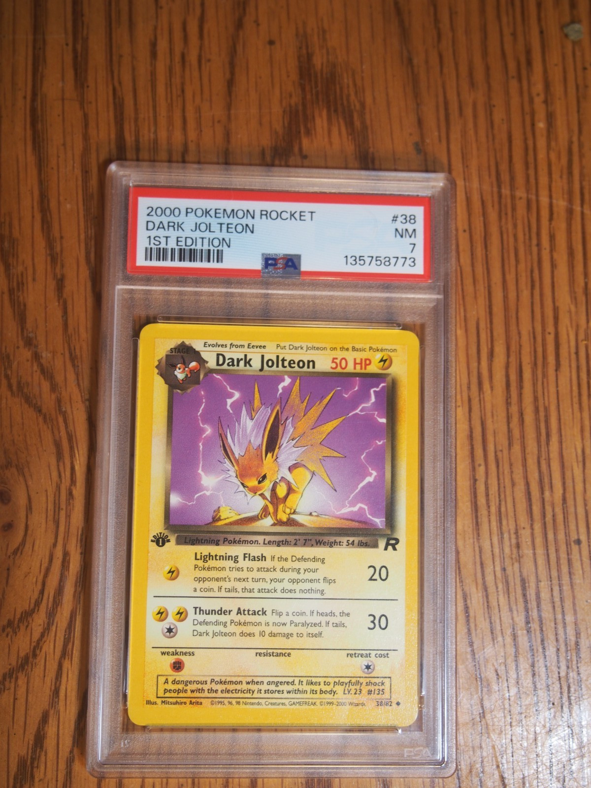 Pokemon 2000 1st Edition Team Rocket Dark Jolteon card,  PSA 7