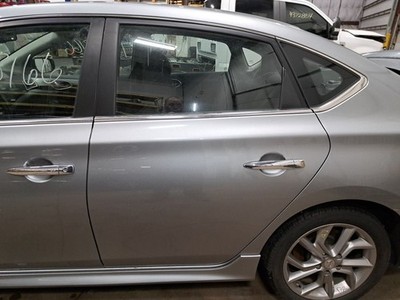 2014 Sentra Left Driver Side Rear Door Assembly Color: Gray K36