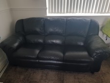 Real black leather sofa and black leather chair