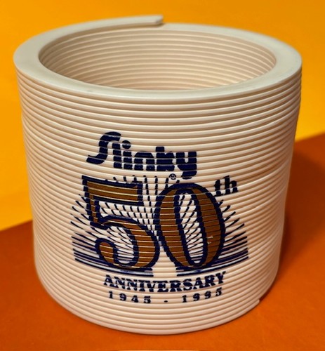 SLINKY 50th Anniversary Embossed White Plastic, RARE, Excellent, FREE SHIPPING