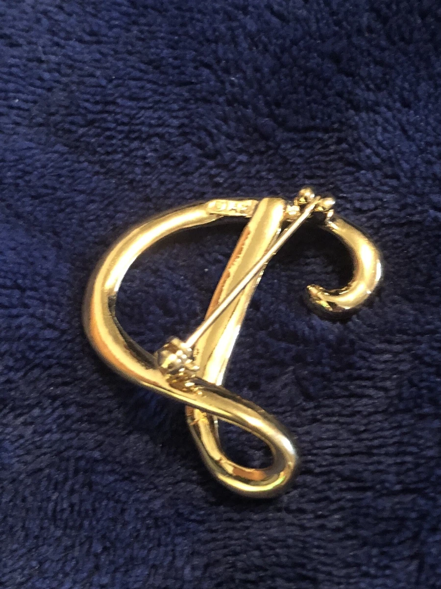 Ak stamped shop on gold
