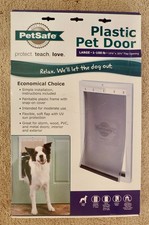 PETSAFE PLASTIC PET DOOR - LARGE SIZE FOR UP TO 100lb DOGS - MINT IN OPENED BOX