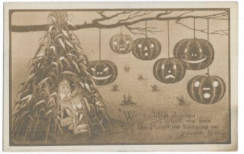 Gibson Art Co. Halloween Postcard JOLs Hanging from tree Kids hiding stalks