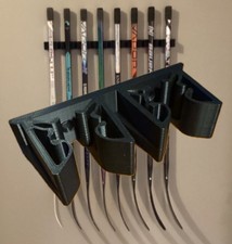 WALL MOUNT RACK FOR BAUER MYSTERY MINI HOCKEY STICKS! HANGS 2 TWO TWIGS ON WALL!