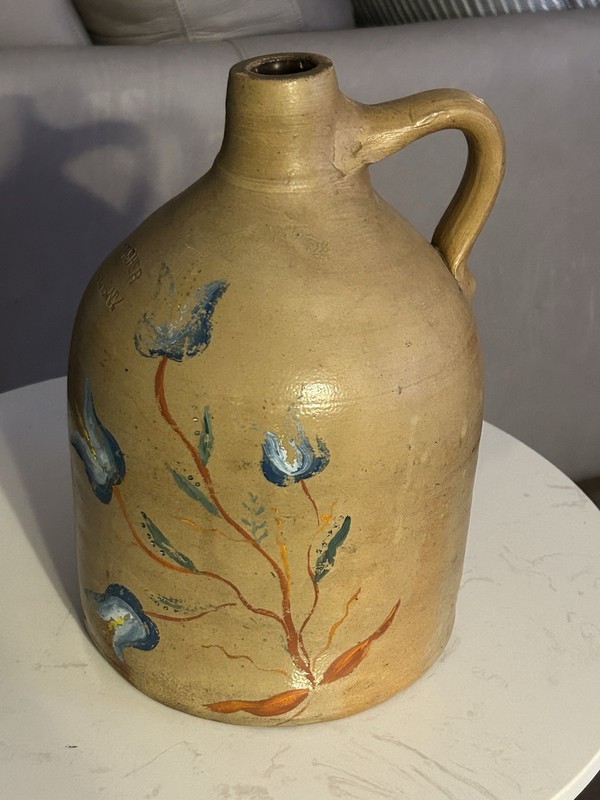 Stoneware jug by Fisher, Lyons, NY