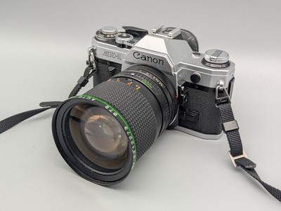 Canon AE-1 Spiegelreflexkamera   Silber   Top Zustand + Hanimex 28-80mm Zoom  