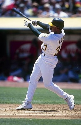 Terrence Long Oakland Athletics follows through on his swing 0duri- Old Photo
