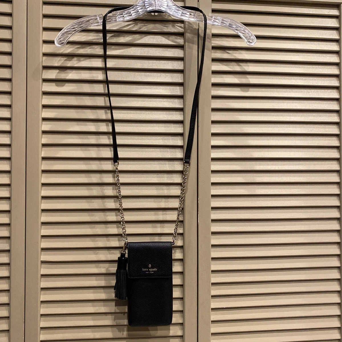 Kate Spade crossbody phone holder north south Black gold . NWOT
