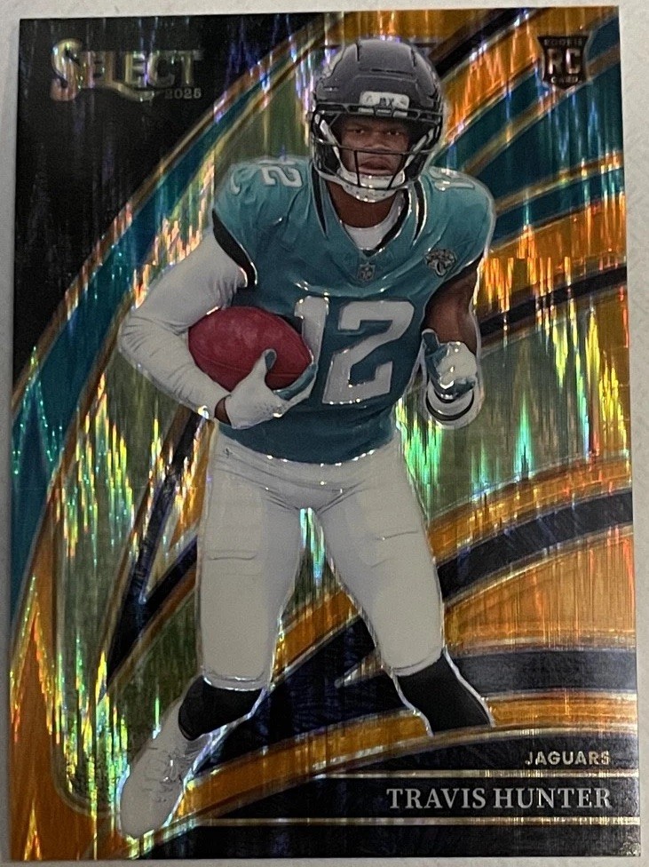 2025 Panini Select - Club Level Travis Hunter #228 Orange Shock Prizm /399 (RC)