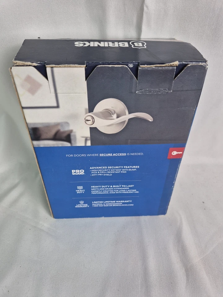 Pomo de puerta con palanca estilo ondulado moderno entrada con llave Brinks con níquel satinado Pro-Guard Foto 3 de 4