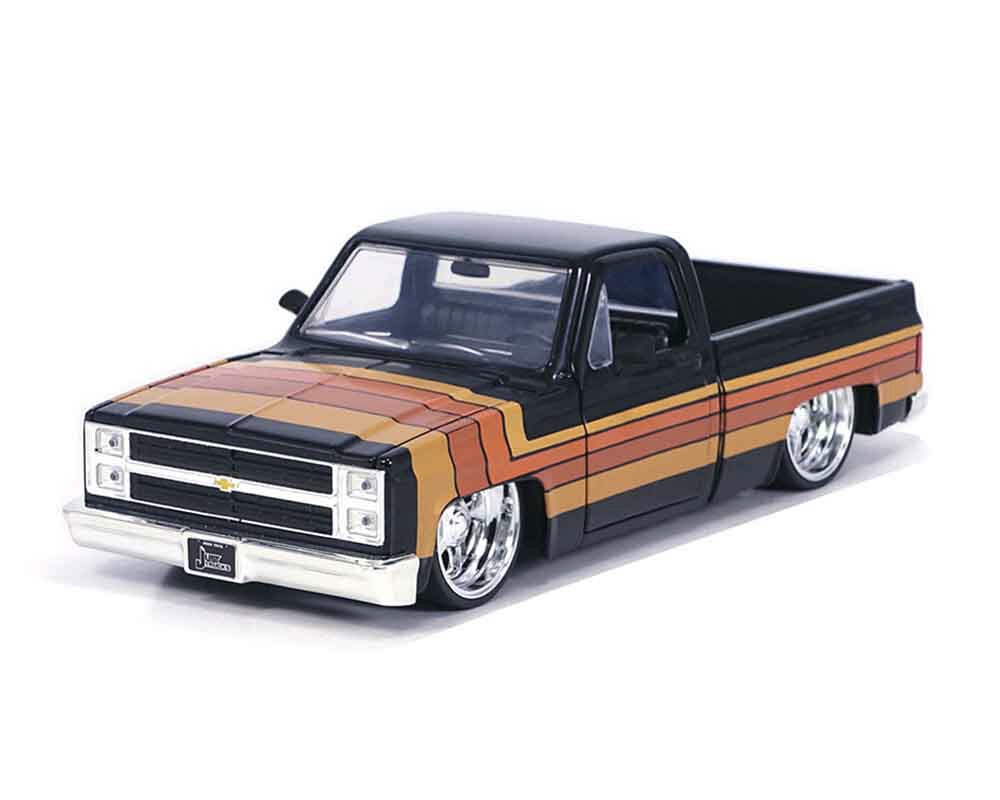 1985 Chevrolet C10 Pickup 1:24 Scale Black w Stripes & Paradox Wheels by Jada 35854