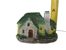White Stone House with climbing vines figurine From Artistic Gifts, Inc.